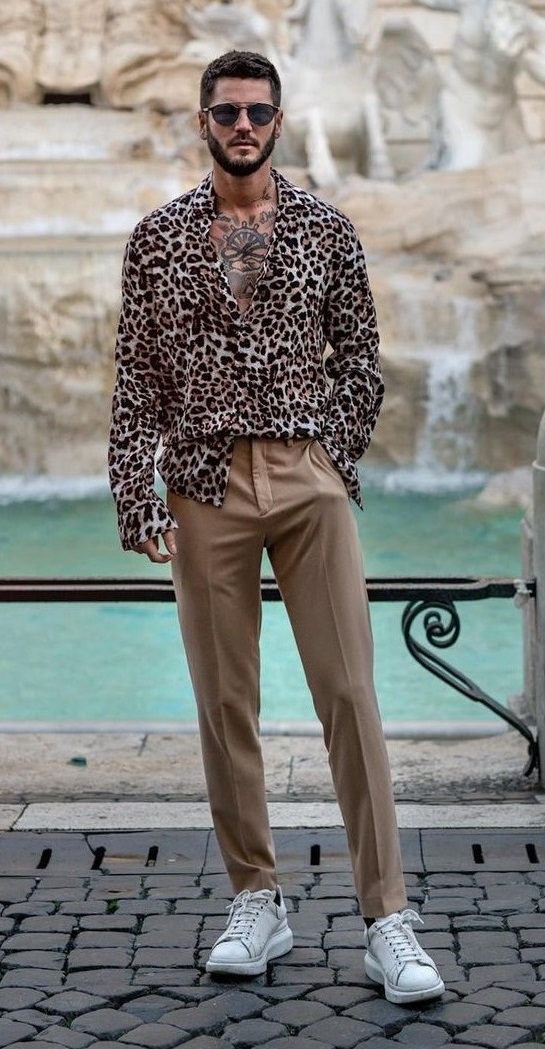 animal printed shirt with beige bottoms and white sneakers with shades Best Fashion Blog For Men TheUnstitchd